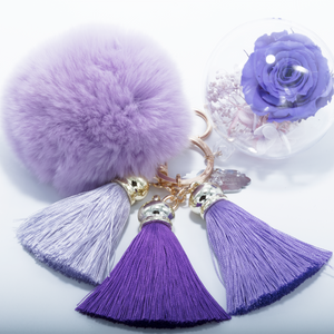 PURPLE PRESERVED ROSE | PURPLE FLUFFY BALL WITH FADED PURPLE THREAD TASSELS KEYCHAIN