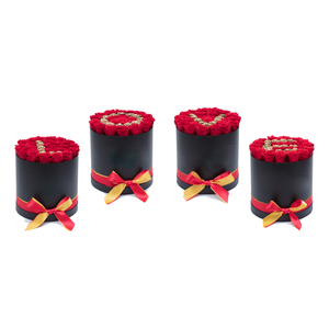 LOVE" Preserved Roses Letter | Set of Four Medium Round Black Huggy Rose Boxes