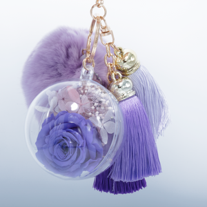 PURPLE PRESERVED ROSE | PURPLE FLUFFY BALL WITH FADED PURPLE THREAD TASSELS KEYCHAIN