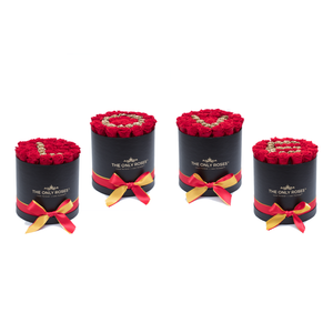 "LOVE" Preserved Roses Letter | Set of Four Medium Round Black Huggy Rose Boxes